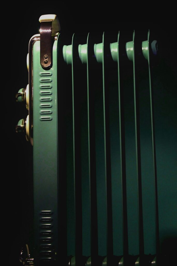 a-close-up-of-a-radiator-in-the-dark-n0zzrysravc